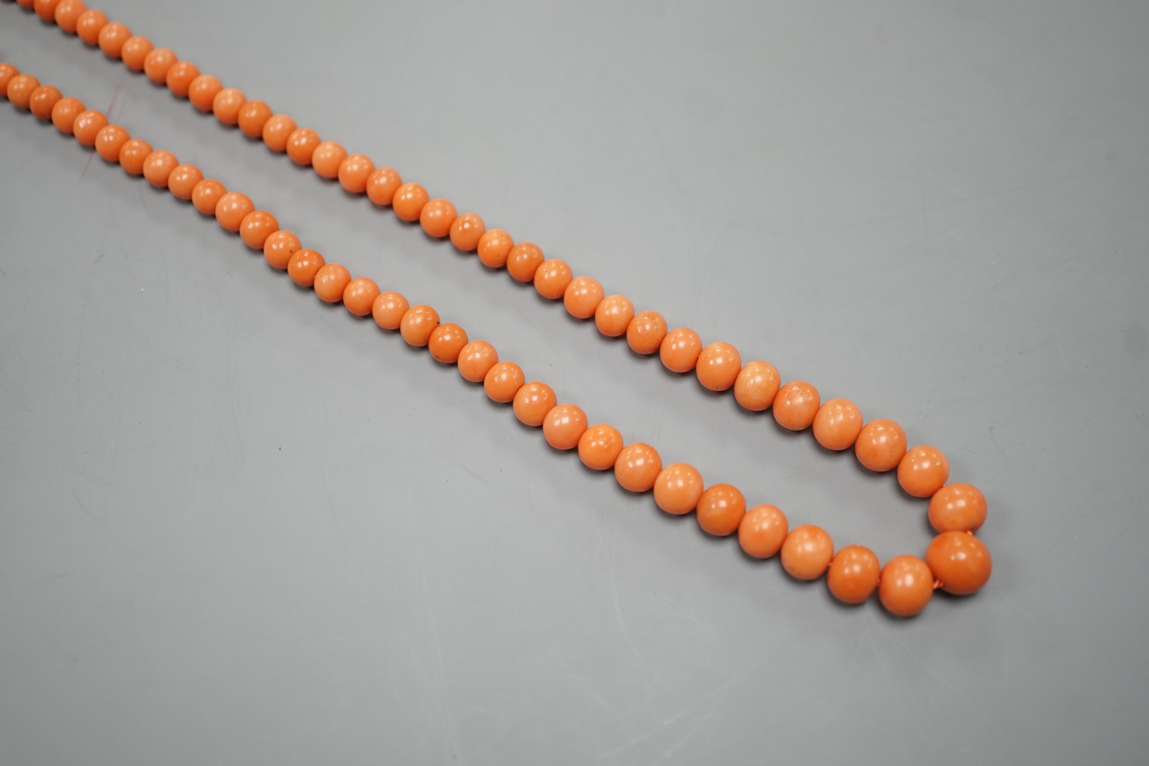A single strand graduated coral bead necklace, 48cm, gross 29 grams.
